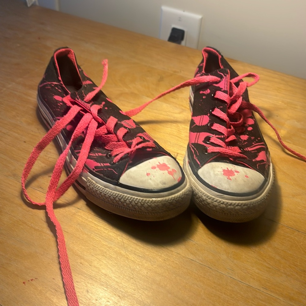 Black and neon, pink paint splatter converse